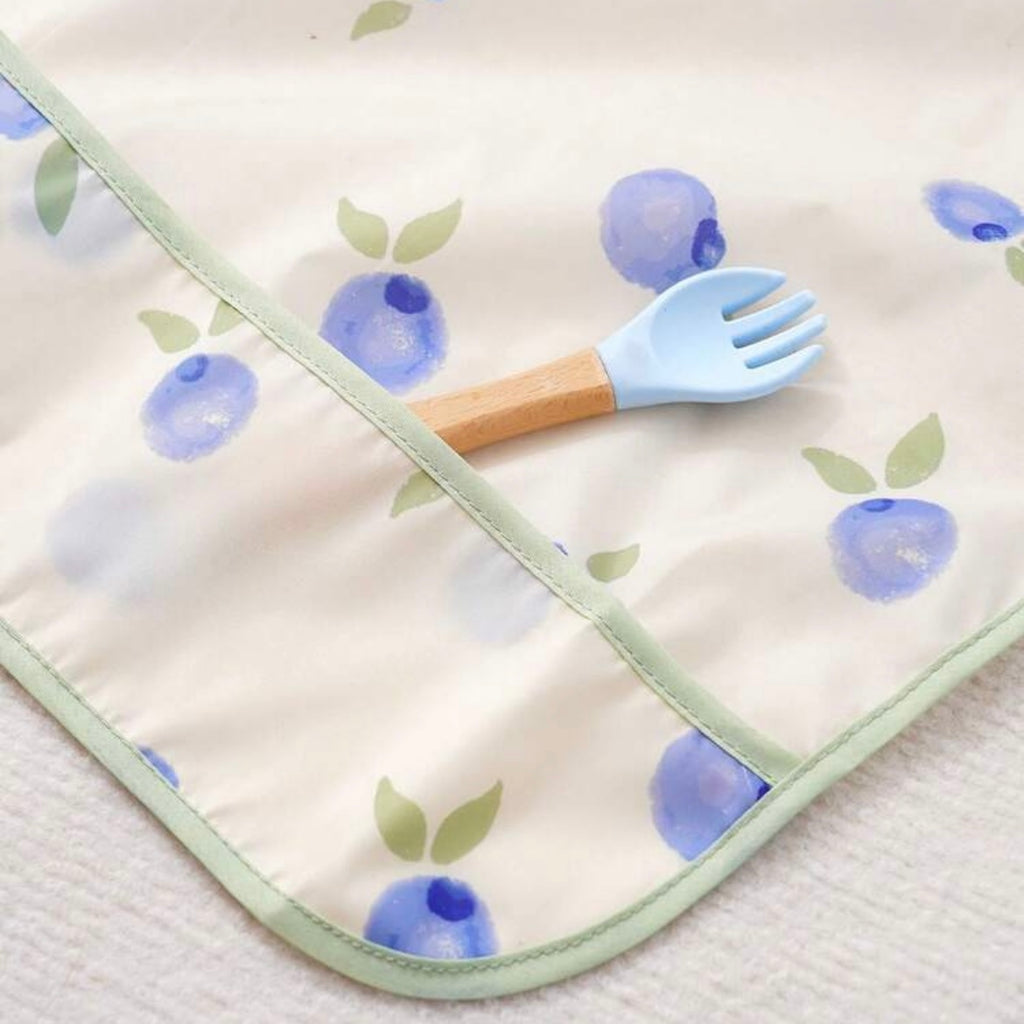 Babero impermeable con mangas