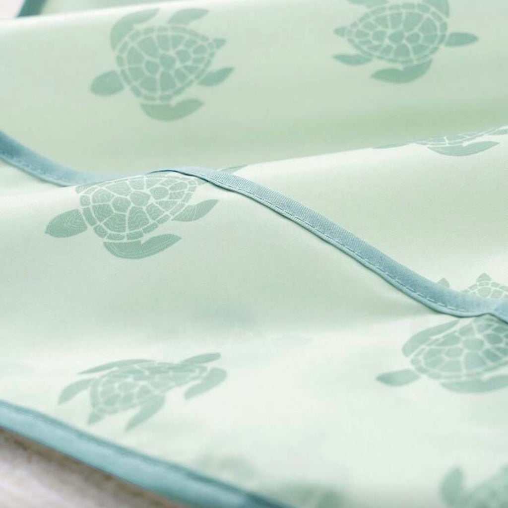 Babero impermeable con mangas