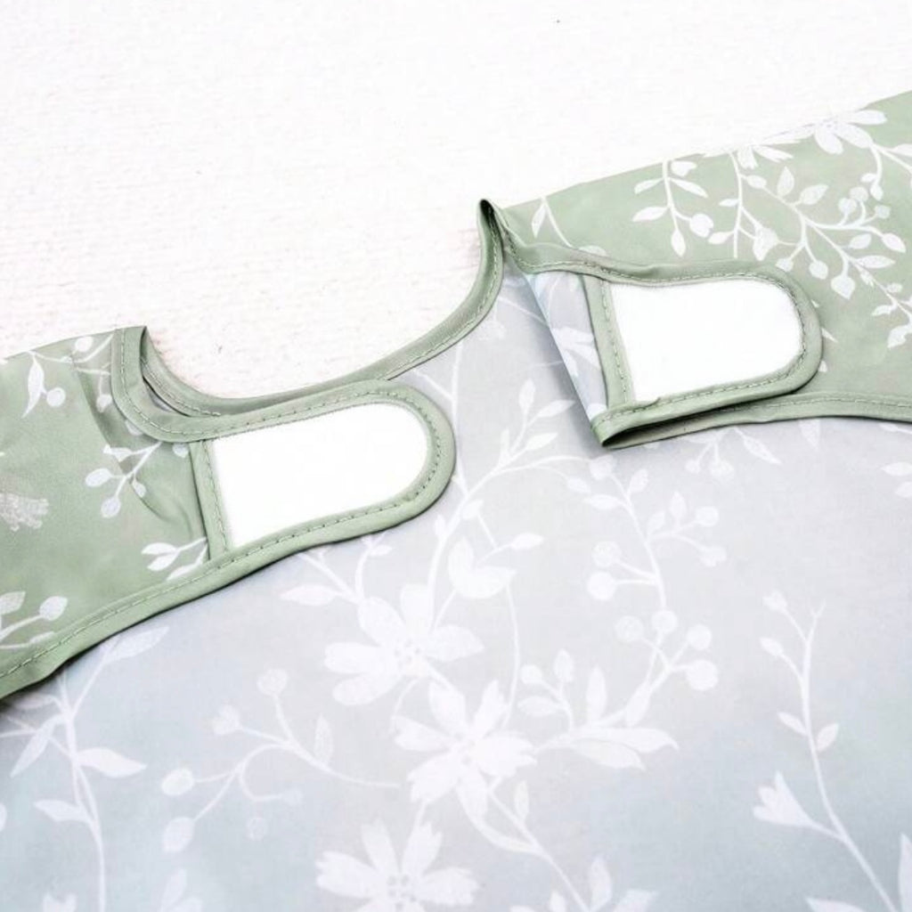 Babero impermeable con mangas