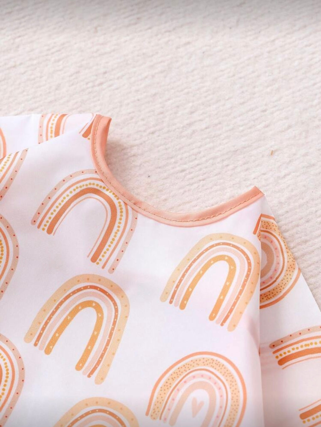 Babero impermeable con mangas